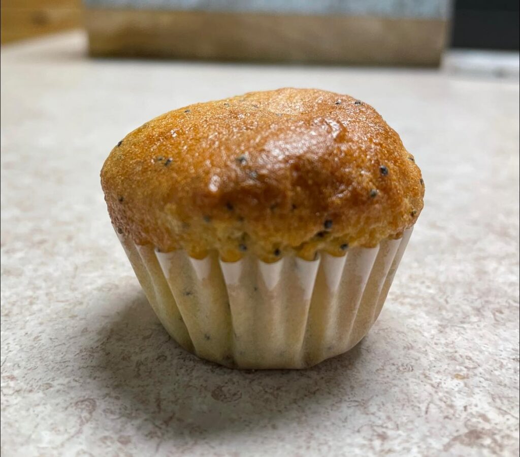 closeup photo of gluten-free lemon poppy seed muffin