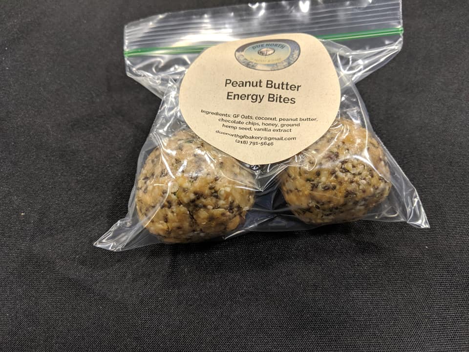 picture of three peanut butter energy bites in a bag