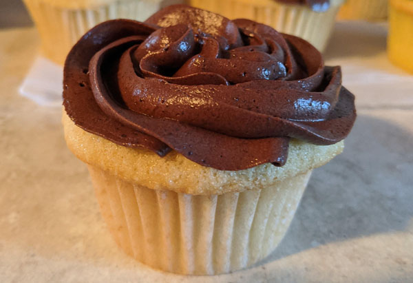 Vanilla cupcake with swirling chocolate frosting
