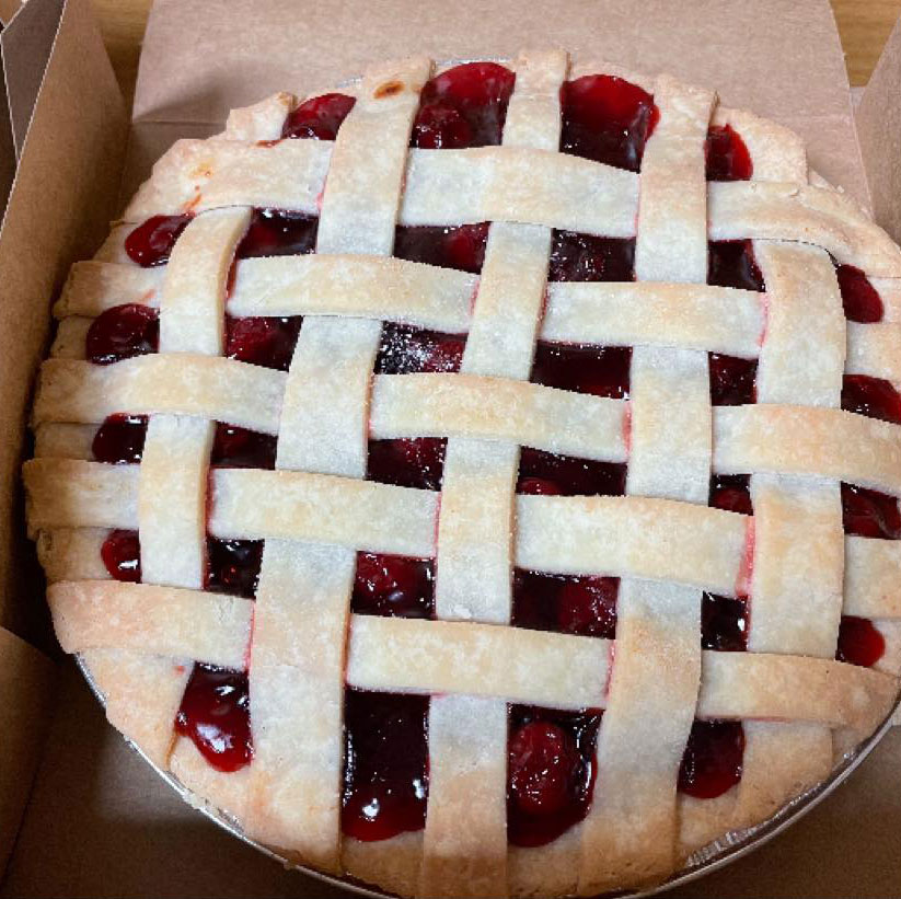 photo of a lattice topped gluten-free  cherry pie