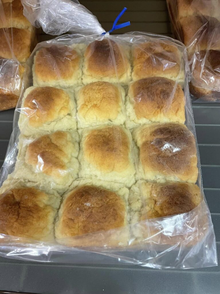 Picture of a bag of one dozen gluten-free dinner rolls.