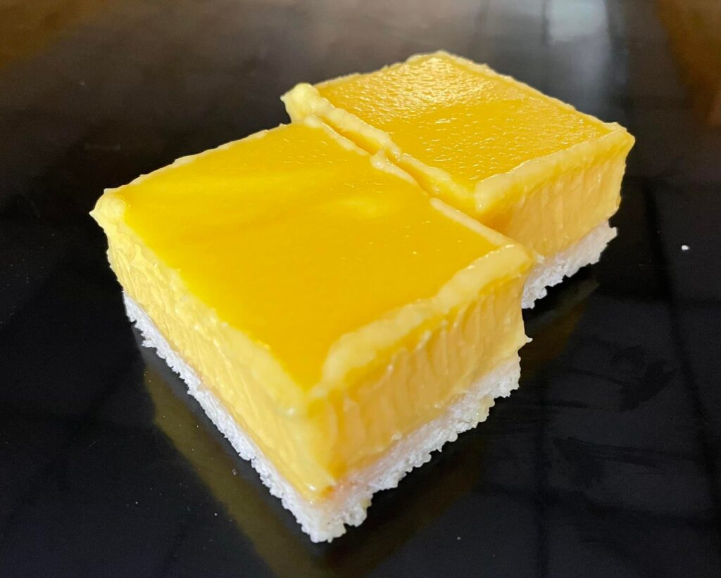 photo of two dairy-free, gluten-free lemon bars
